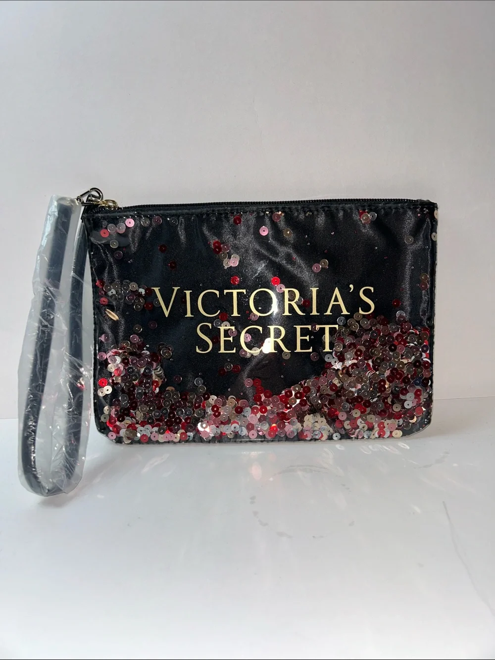 Victoria's Secret Floating Confetti Sequin Wristlet Pouch.
